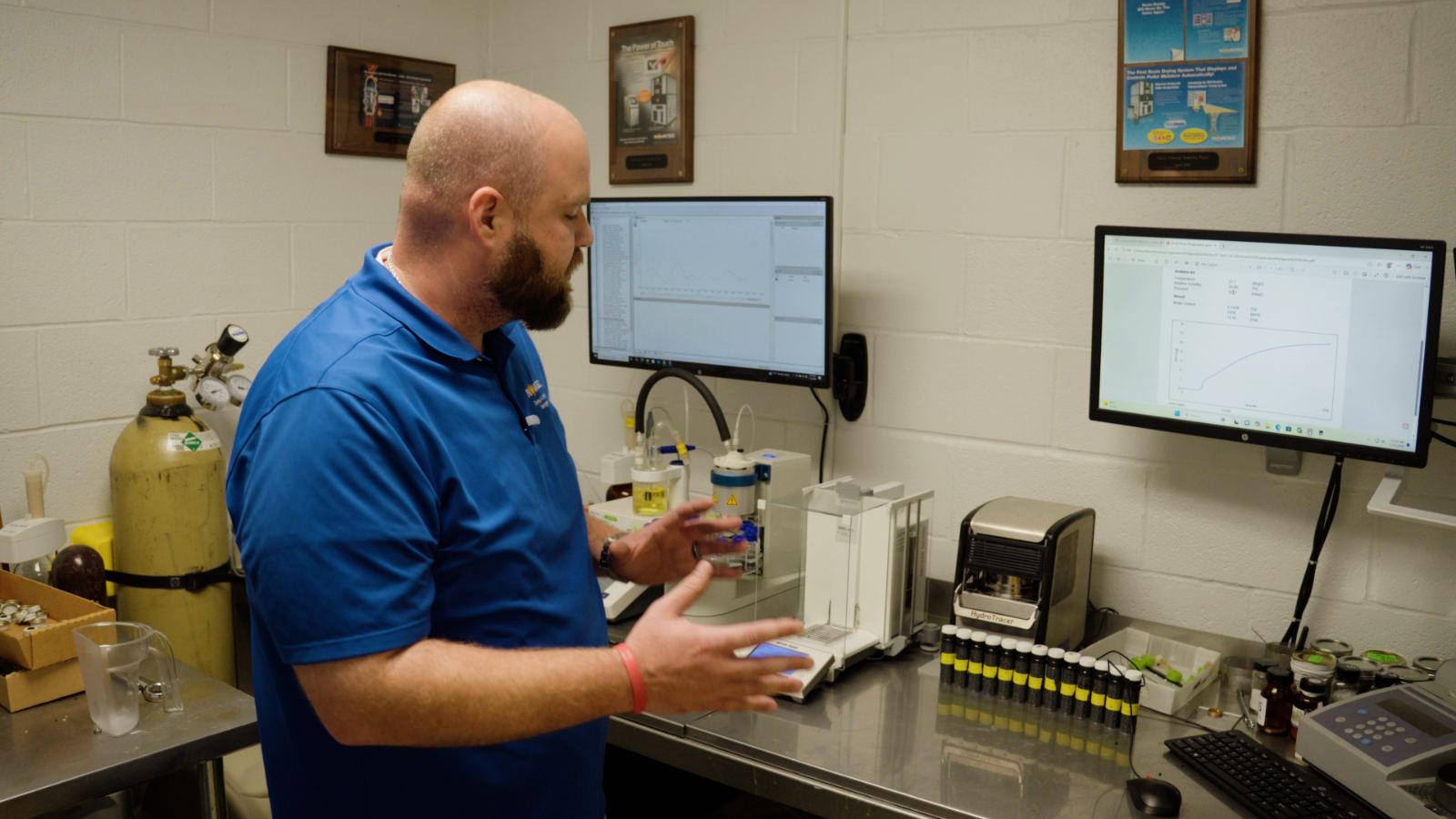A lab technician runs Karl Fischer titration at the bench