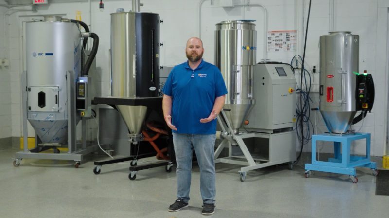 A Novatec engineer introduces the dryer test floor at The Resin Proving Ground